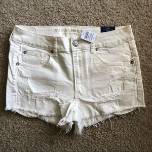 White distressed denim shorts